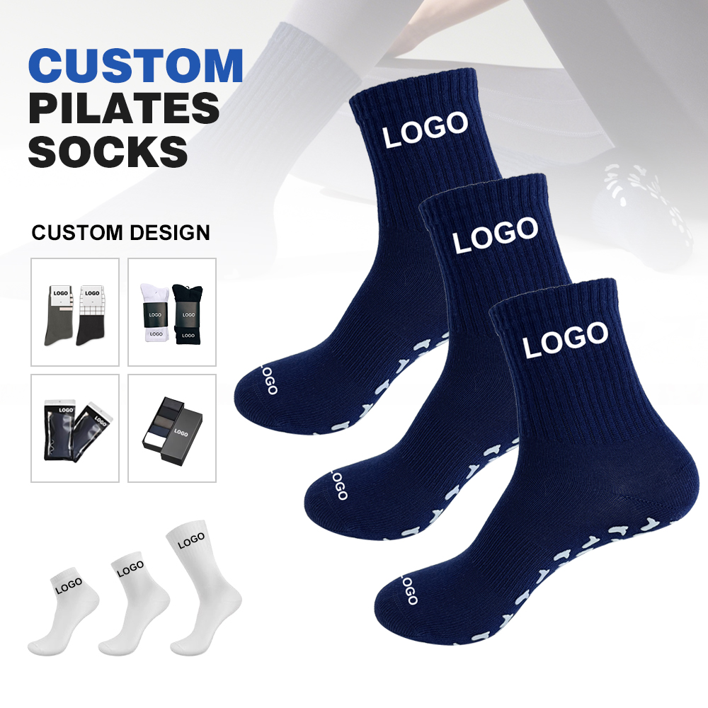 Three navy ribbed custom yoga grip socks showing cuff-logo placement options