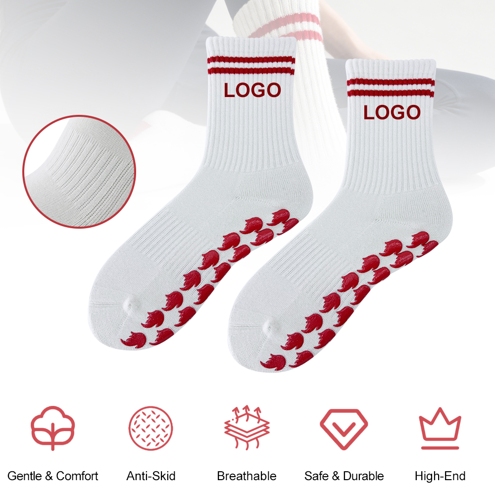 White crew socks showing photographed red sole-grip motifs