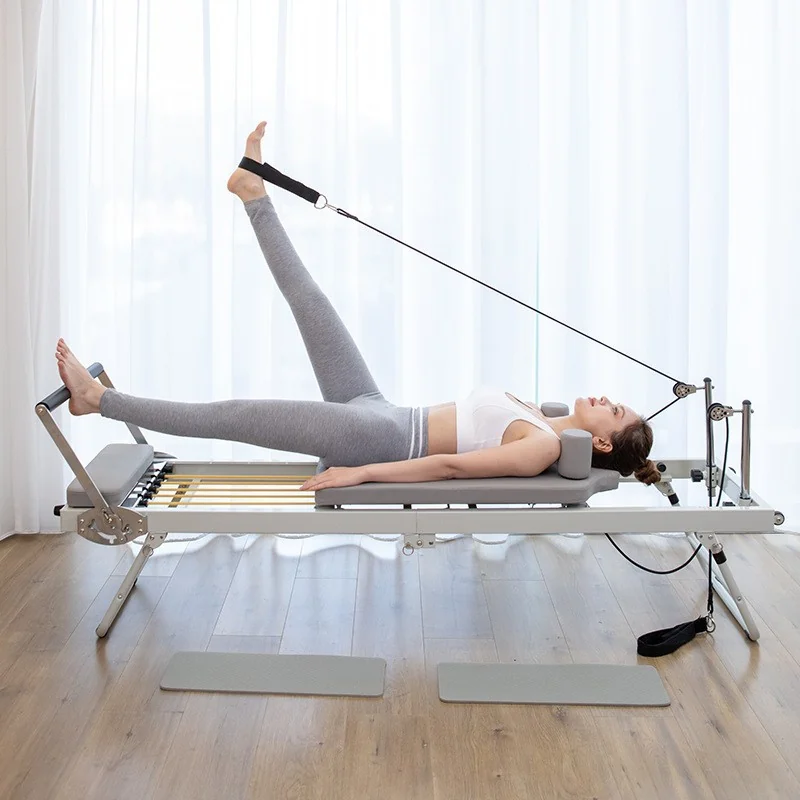 Pilates reformer in a bright room