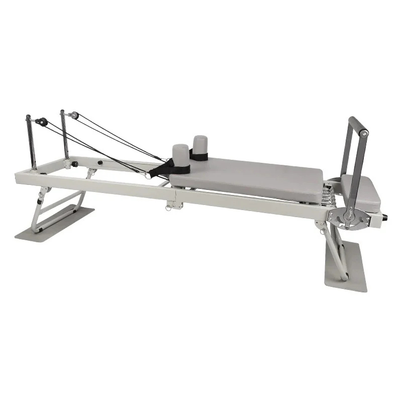 Compact metal Pilates reformer