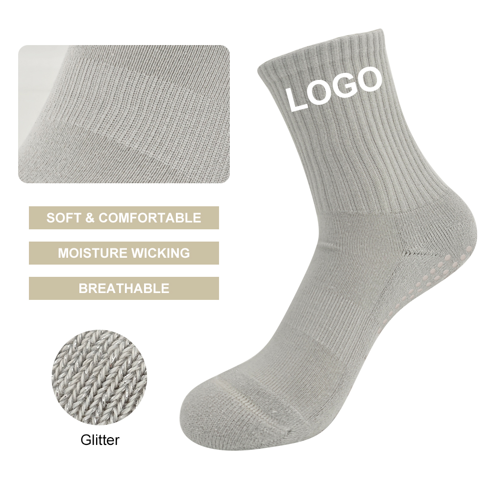 Grey custom Pilates grip sock with silver metallic yarn, ribbed crew cuff and full-sole grip